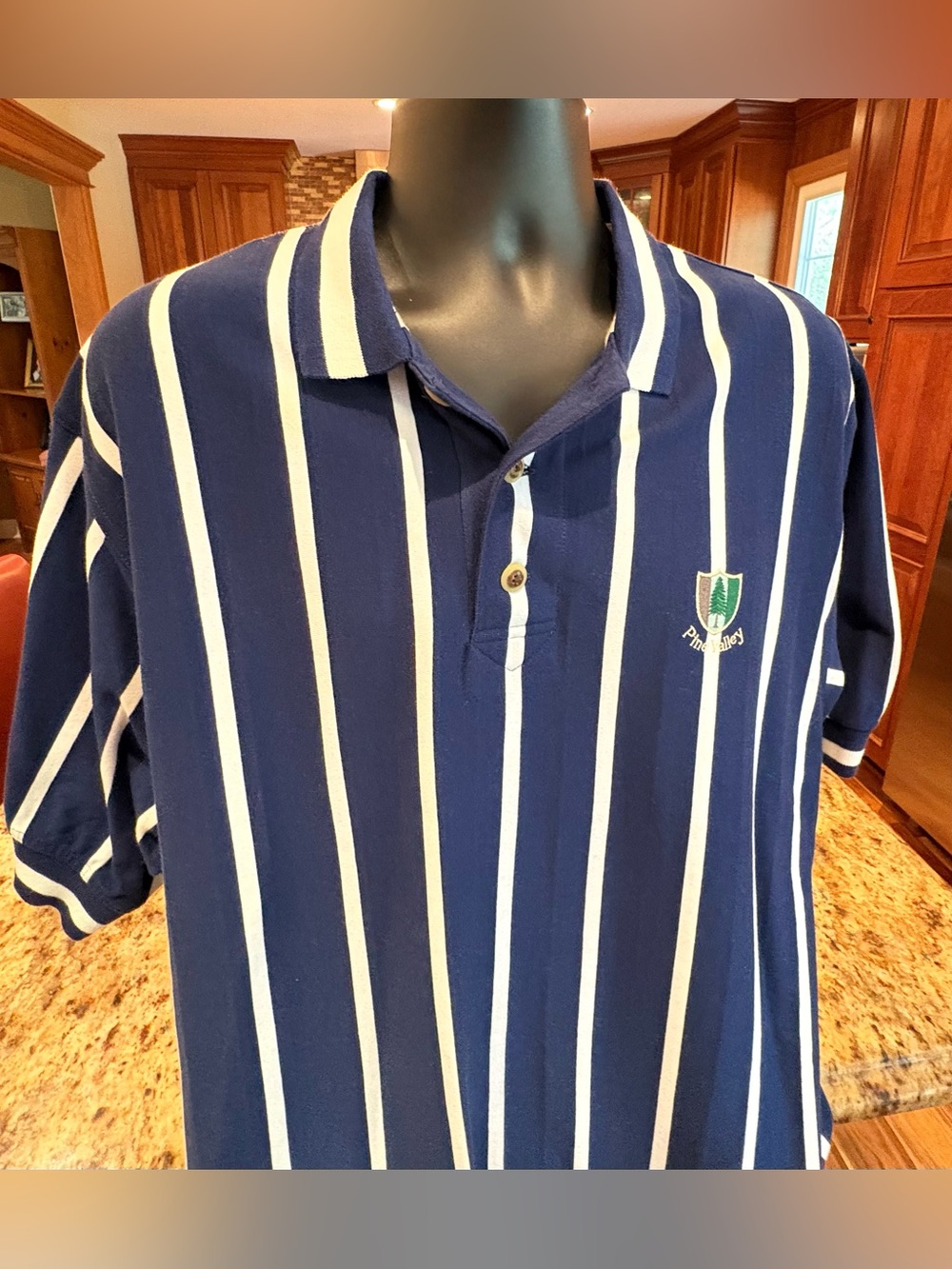 Pine Valley men’s polo/rugby shirt. Sharp blue w/white stripes & iconic PV logo.